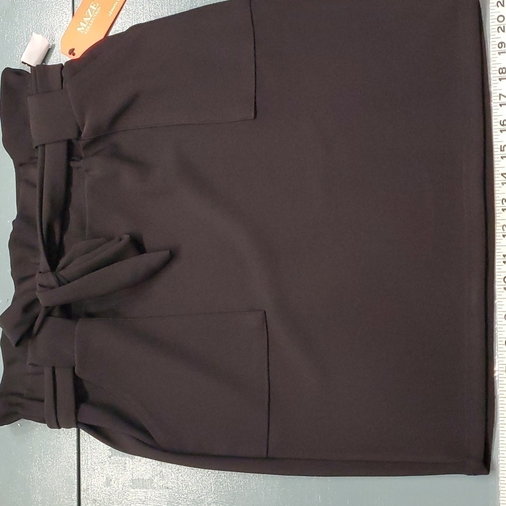 Maze black mini skirt. Y2K NWT. Size PL. Cute tie‎ at waist and 2 big pockets.